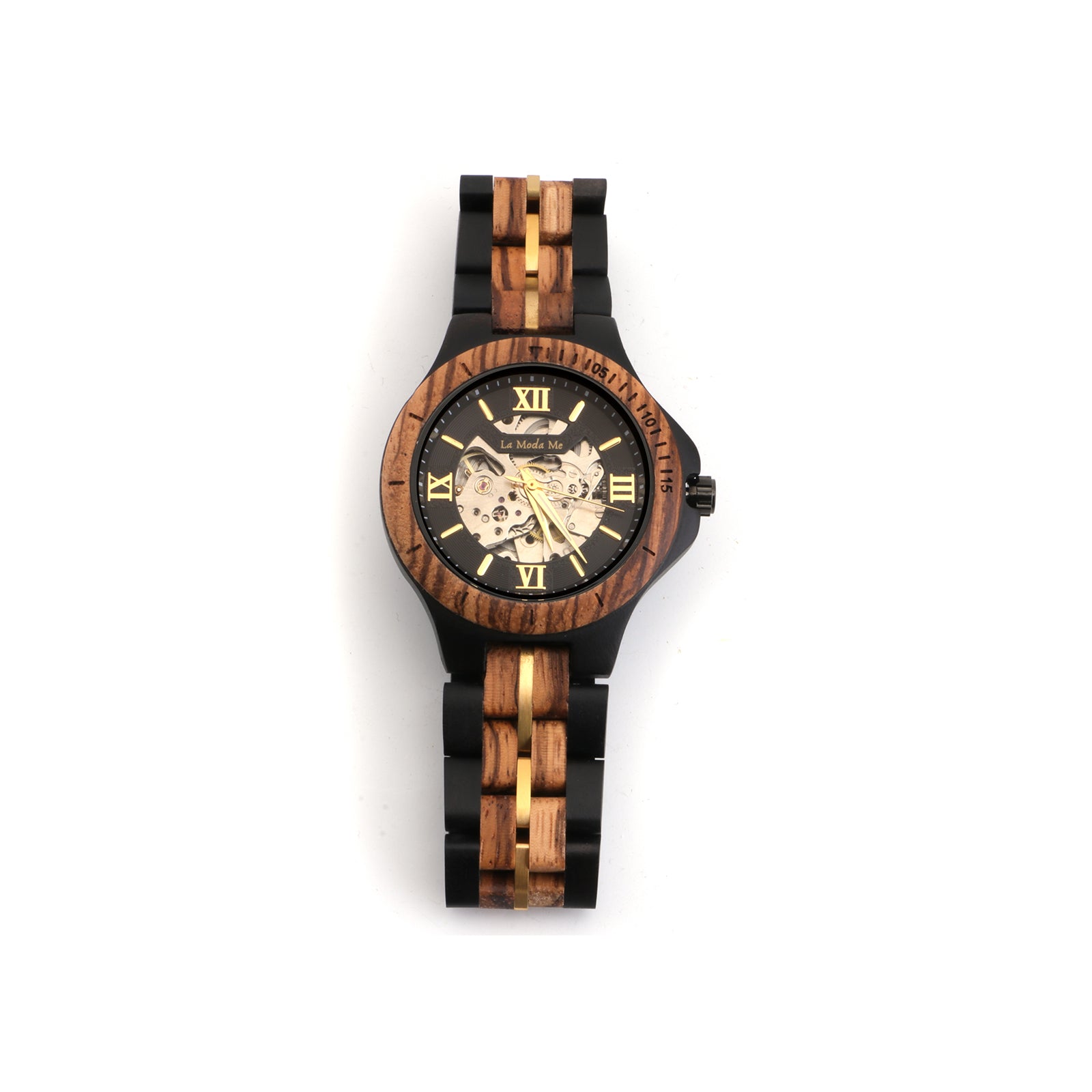 Chronograph wristwatch with a black and gold dial, exposed mechanical design, and a two-tone strap made of dark wood and stainless steel. The bezel features a woodgrain texture, and the dial is branded with “La Moda Me”.