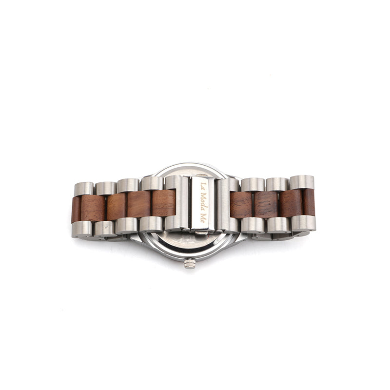 Back view of a men’s wristwatch with a two-tone strap made of dark wood and silver-toned stainless steel. The clasp is engraved with “La Moda Me”.